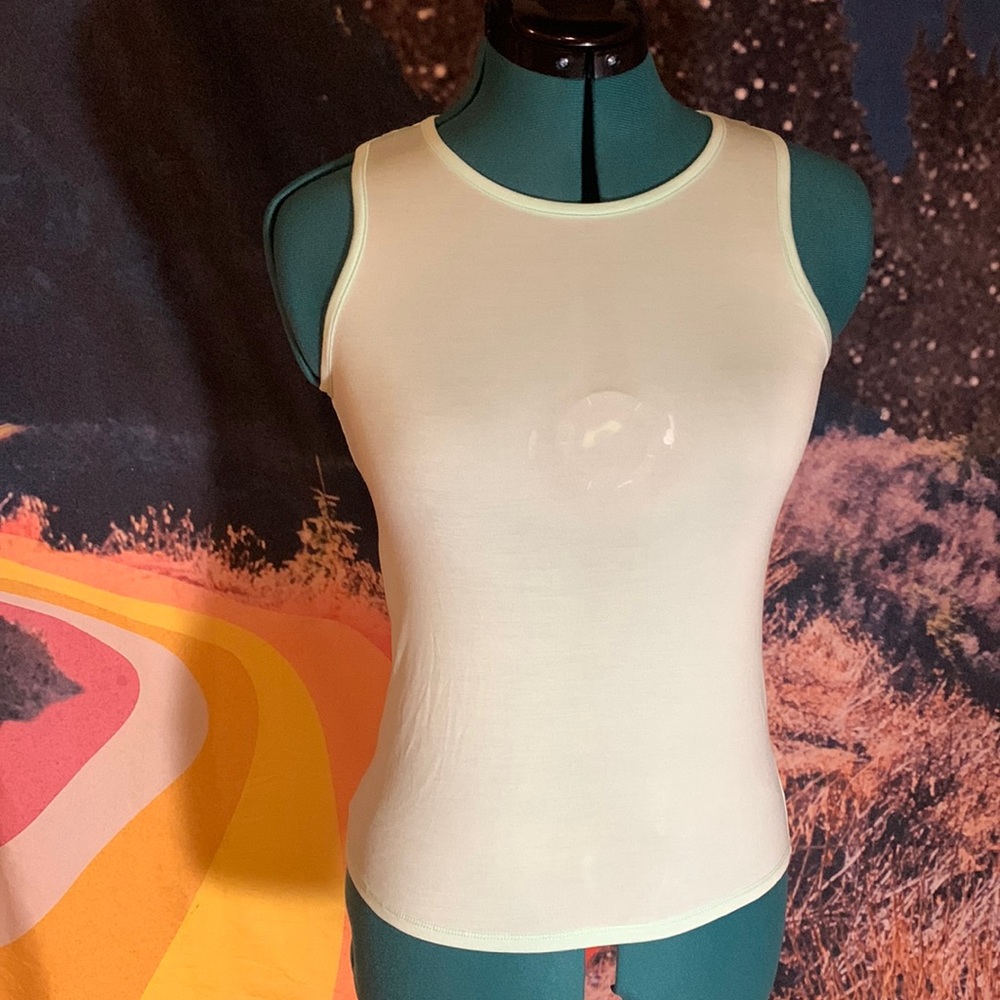 NWT light blue tank top with crisscrossing back size medium
